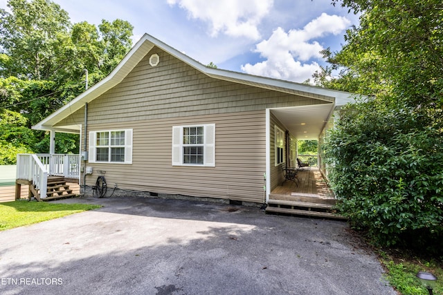 460 Red Bud Ln, Sevierville, TN 37876 - rear view of house with crawl space and a wooden deck