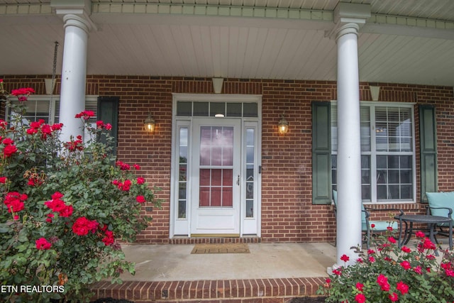 1223 Walnut Branch Ln, Knoxville, TN 37922 - doorway to property with covered porch and brick siding