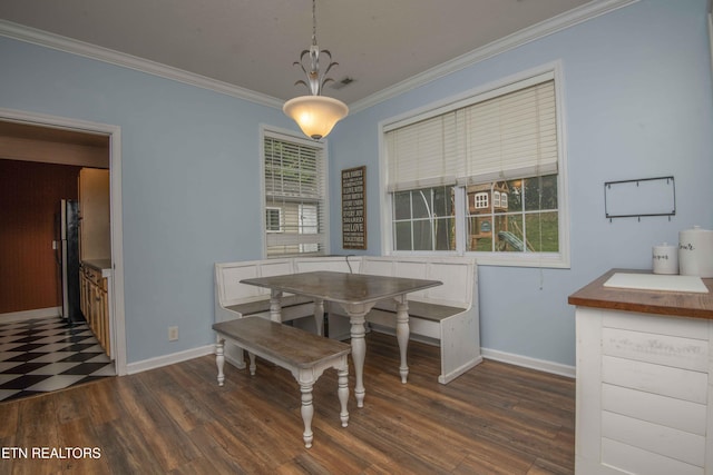 1223 Walnut Branch Ln, Knoxville, TN 37922 - dining area with crown molding and dark wood-type flooring