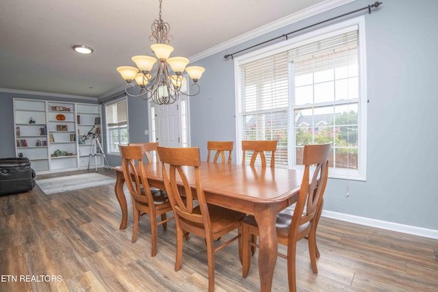 1223 Walnut Branch Ln, Knoxville, TN 37922 - dining space featuring ornamental molding, a chandelier, and wood finished floors
