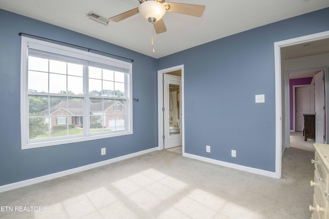 1223 Walnut Branch Ln, Knoxville, TN 37922 - unfurnished bedroom with light carpet, ensuite bath, and ceiling fan