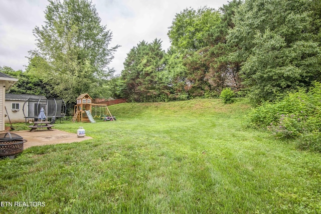 1223 Walnut Branch Ln, Knoxville, TN 37922 - view of yard with a fire pit, a playground, a patio, and a trampoline