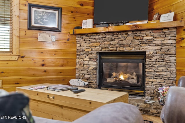4110 Kidds Way Unit 6, Gatlinburg, TN 37738 - living area with wood walls, a stone fireplace, and wood finished floors