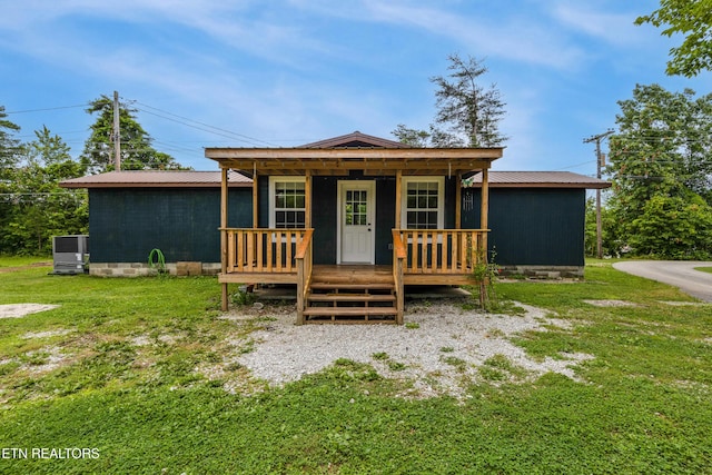 210 Conifer Rd, Winfield, TN 37892 - view of front of property with a front yard, covered porch, a metal roof, and crawl space