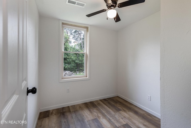 210 Conifer Rd, Winfield, TN 37892 - empty room with wood finished floors and a ceiling fan