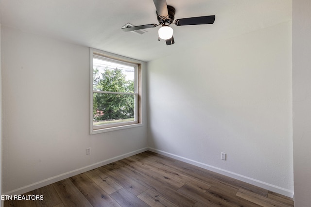 210 Conifer Rd, Winfield, TN 37892 - unfurnished room with wood finished floors and a ceiling fan