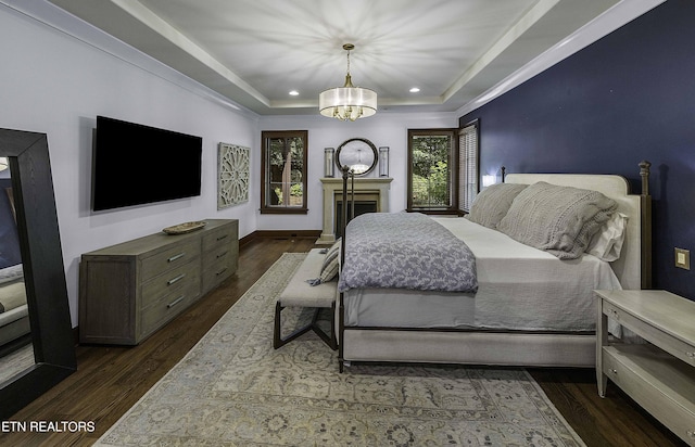 11211 Matthews Cove Ln, Knoxville, TN 37934 - bedroom with a chandelier, dark wood-style flooring, recessed lighting, and a tray ceiling