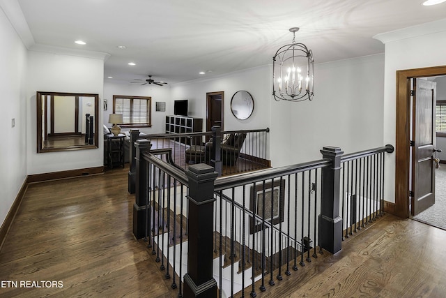 11211 Matthews Cove Ln, Knoxville, TN 37934 - corridor with an upstairs landing, dark wood-type flooring, a chandelier, recessed lighting, and crown molding