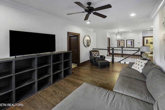 11211 Matthews Cove Ln, Knoxville, TN 37934 - living area featuring dark wood finished floors, a ceiling fan, a chandelier, recessed lighting, and crown molding