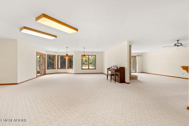 136 Oostagala Dr, Loudon, TN 37774 - carpeted spare room featuring baseboards and a ceiling fan