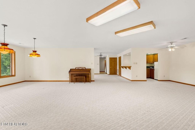 136 Oostagala Dr, Loudon, TN 37774 - unfurnished living room with a ceiling fan and light colored carpet