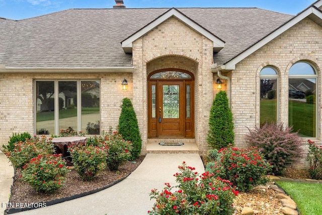 136 Oostagala Dr, Loudon, TN 37774 - property entrance with brick siding and a shingled roof