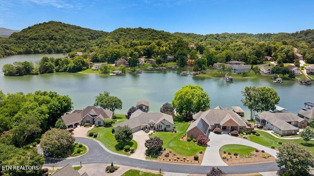 136 Oostagala Dr, Loudon, TN 37774 - aerial view of residential area featuring a large body of water and a forest