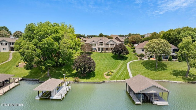 136 Oostagala Dr, Loudon, TN 37774 - dock area with boat lift, a water view, and a lawn