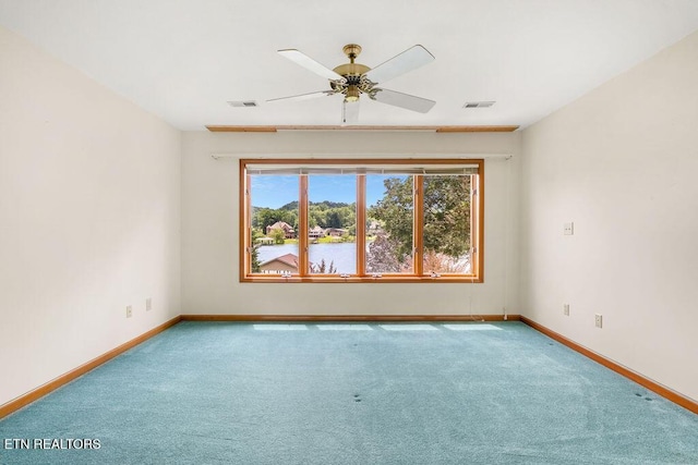 136 Oostagala Dr, Loudon, TN 37774 - carpeted empty room featuring baseboards and a ceiling fan