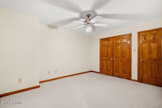 136 Oostagala Dr, Loudon, TN 37774 - unfurnished bedroom with light carpet, a closet, and a ceiling fan