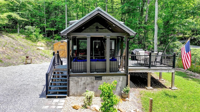 1429 Alpine Dr, Sevierville, TN 37876 - view of outbuilding featuring stairway and a forest view