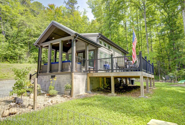 1429 Alpine Dr, Sevierville, TN 37876 - view of side of property with a lawn and a deck