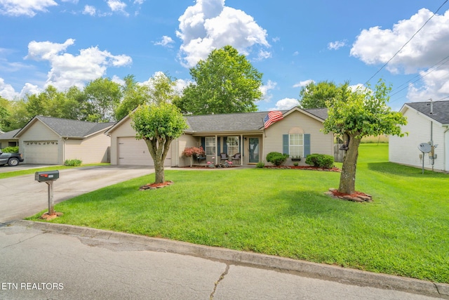 7527 Wheatmeadow Rd, Corryton, TN 37721 - ranch-style home featuring concrete driveway, an attached garage, and a front lawn