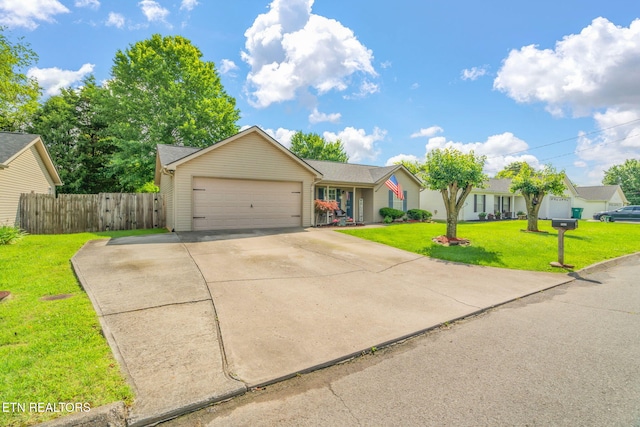7527 Wheatmeadow Rd, Corryton, TN 37721 - view of front of property featuring a garage and concrete driveway