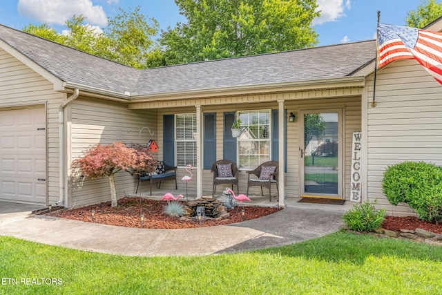 7527 Wheatmeadow Rd, Corryton, TN 37721 - view of front facade featuring covered porch, an attached garage, and roof with shingles