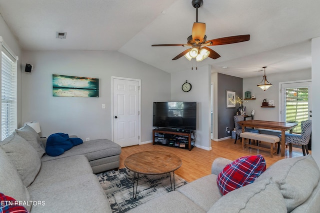 7527 Wheatmeadow Rd, Corryton, TN 37721 - living room featuring wood finished floors, a ceiling fan, and lofted ceiling