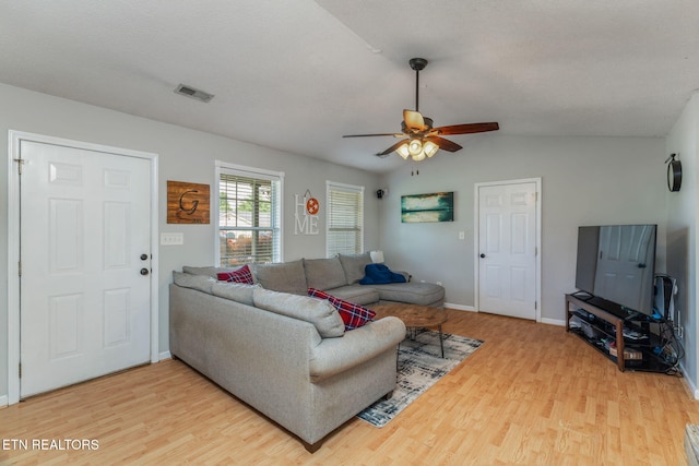 7527 Wheatmeadow Rd, Corryton, TN 37721 - living room with light wood-style floors, a ceiling fan, and lofted ceiling