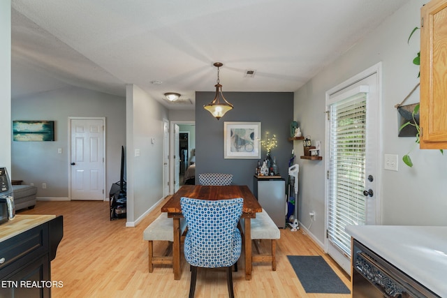 7527 Wheatmeadow Rd, Corryton, TN 37721 - dining space with light wood-type flooring and lofted ceiling