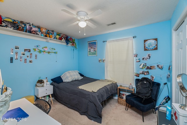 7527 Wheatmeadow Rd, Corryton, TN 37721 - carpeted bedroom with a closet, ceiling fan, and a textured ceiling