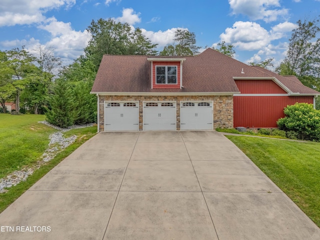135 Chanusi Way, Loudon, TN 37774 - view of front of property featuring stone siding, a front lawn, a garage, and a shingled roof