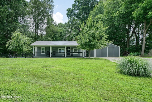 502 Midnight Dr, Byrdstown, TN 38549 - view of front facade with covered porch and a metal roof