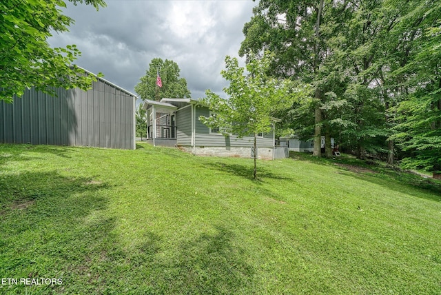 502 Midnight Dr, Byrdstown, TN 38549 - view of grassy yard with a pole building