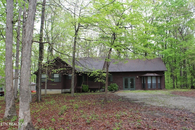 108 Laurel Dr, Jamestown, TN 38556 - view of front of property with french doors, crawl space, and roof with shingles