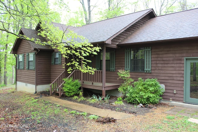 108 Laurel Dr, Jamestown, TN 38556 - view of side of home featuring roof with shingles
