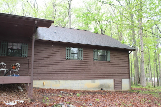 108 Laurel Dr, Jamestown, TN 38556 - view of side of home with crawl space and roof with shingles