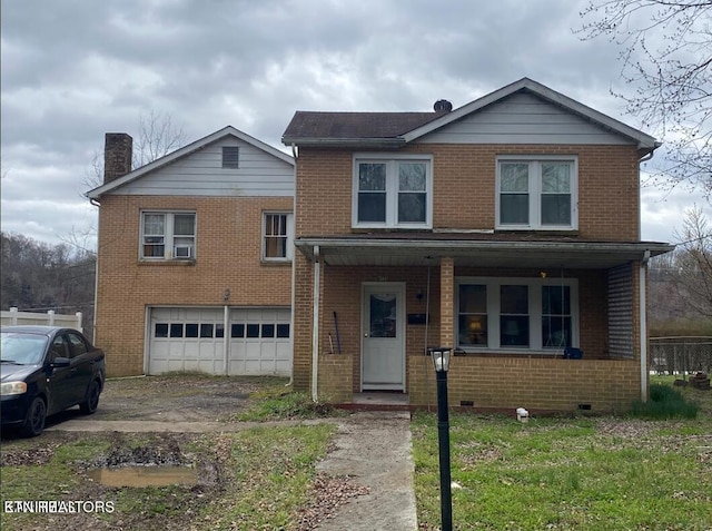 722 Sewanee St, Harriman, TN 37748 - view of front of home featuring brick siding, a garage, a porch, and a chimney