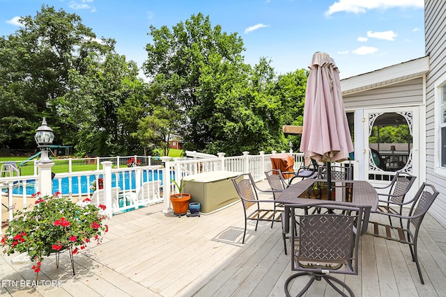 7110 Royal Springs Blvd, Knoxville, TN 37918 - deck featuring outdoor dining area and view of wooded area