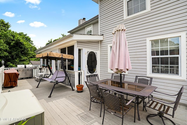 7110 Royal Springs Blvd, Knoxville, TN 37918 - wooden deck with a sunroom and outdoor dining area