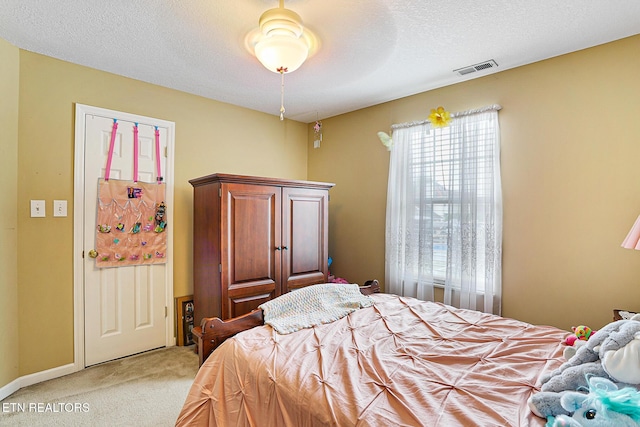 7110 Royal Springs Blvd, Knoxville, TN 37918 - bedroom featuring light carpet and a textured ceiling