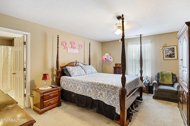 7110 Royal Springs Blvd, Knoxville, TN 37918 - bedroom with light carpet, a textured ceiling, and a ceiling fan