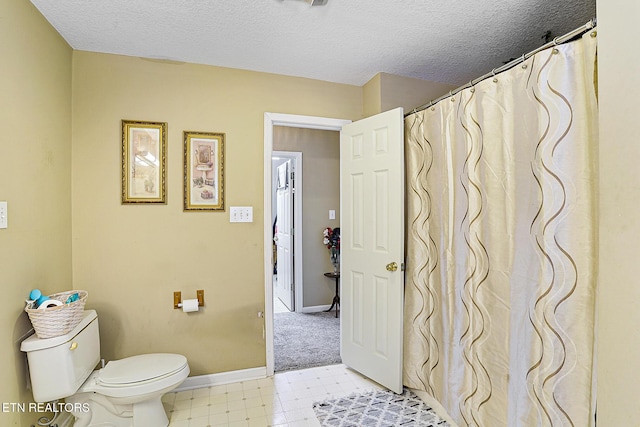 7110 Royal Springs Blvd, Knoxville, TN 37918 - full bathroom featuring a textured ceiling and tile patterned floors