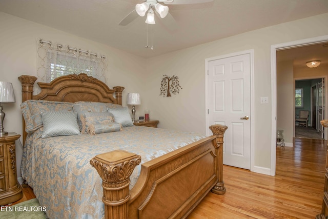506 Blockhouse Valley Rd, Clinton, TN 37716 - bedroom with light wood-type flooring and a ceiling fan