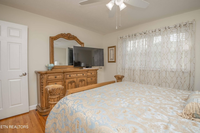 506 Blockhouse Valley Rd, Clinton, TN 37716 - bedroom featuring wood finished floors and ceiling fan