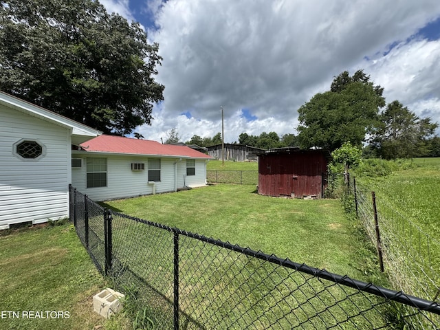 109 Henry Mayfield Rd, Tellico Plains, TN 37385 - fenced backyard featuring a storage unit