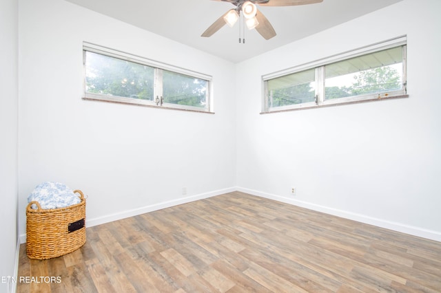 7908 Collier Rd, Powell, TN 37849 - spare room featuring wood finished floors and ceiling fan