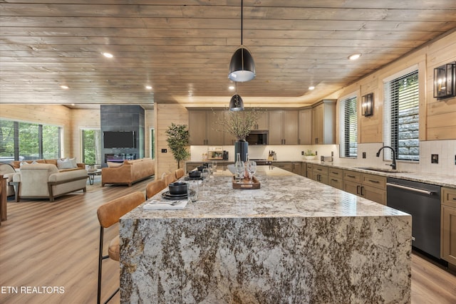 1646 Bear Valley Rd, Sevierville, TN 37876 - kitchen with appliances with stainless steel finishes, light wood-style flooring, plenty of natural light, a center island, and wood ceiling