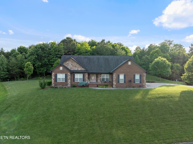 5484 Shadow Branch Ln, Corryton, TN 37721 - ranch-style home with a front lawn, brick siding, and covered porch