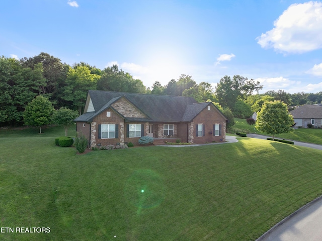 5484 Shadow Branch Ln, Corryton, TN 37721 - view of front of home with a front yard and brick siding