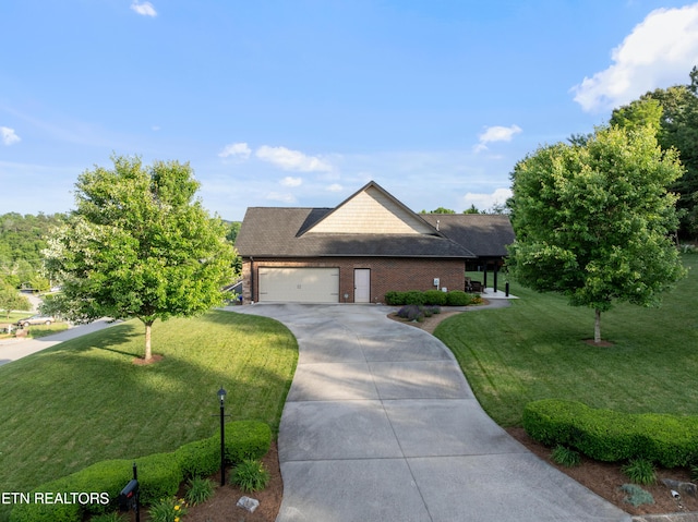 5484 Shadow Branch Ln, Corryton, TN 37721 - view of front of home featuring a front lawn, an attached garage, brick siding, driveway, and roof with shingles