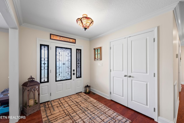 5484 Shadow Branch Ln, Corryton, TN 37721 - foyer entrance featuring dark wood finished floors, crown molding, and a textured ceiling